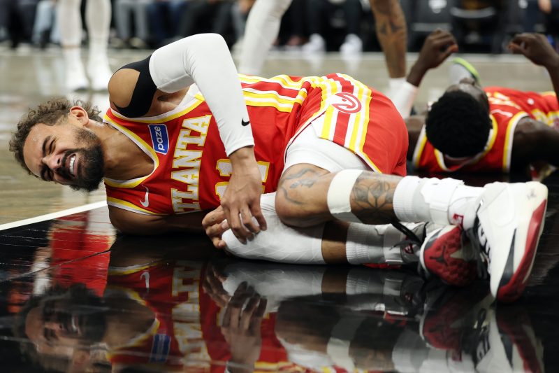 Atlanta Hawks star Trae Young was knocked out of Wednesday night’s game against the Brooklyn Nets after injuring his knee.
The four-time All-Star was hurt in the first quarter when teammate Mouhamed Gueye fell into his right leg. Young grabbed at the leg immediately with both hands. He was seen on the broadcast conversing with head coach Quin Snyder.
Young played 17 more seconds before heading back to the locker room. He was ruled out for the game with what the Hawks called a ‘right knee sprain.’
The Hawks faced increased expectations this season but entered Wednesday’s game at 1-3. Not helping has been an injury report loaded with big names in the past week, including Jalen Johnson (ankle), 2024 top pick Zaccharie Risacher (ankle) and big offseason acquisition Kristaps Porzingis (flu). Those three <em>were</em> in the lineup Wednesday, though now attention turns to Young’s health.
Young, 27, entered Wednesday’s game averaging 20.8 points and 9.5 assists on the season.
Trae Young injury update
Hawks coach Quin Snyder told reporters after Atlanta’s 117-112 win that Young would be getting an MRI either Wednesday night or on Thursday. He also noted that Young did not injure his ACL.
<em>This story has been updated with new information.</em>
This post appeared first on USA TODAY